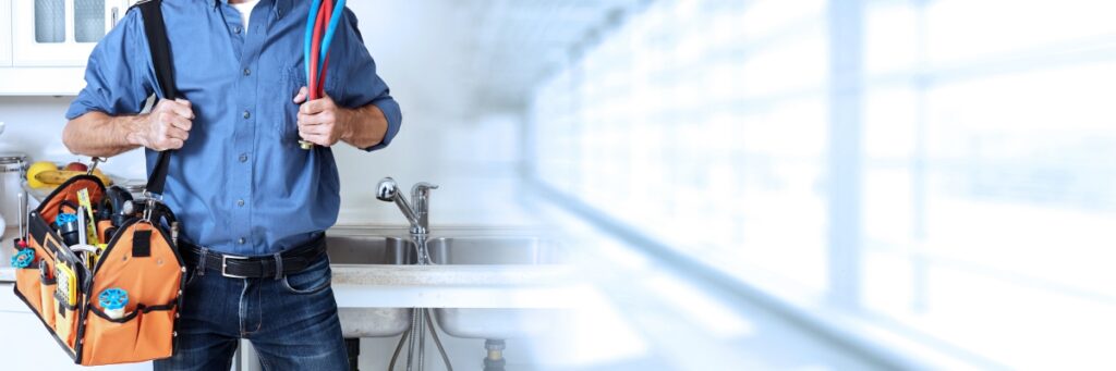 plumber with tools