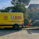 action jackson van parked on street