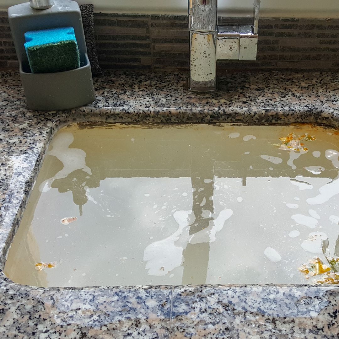 image of a clogged sink