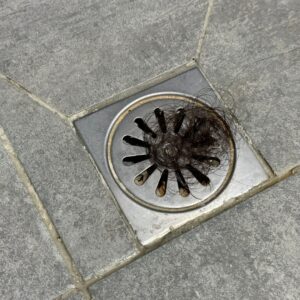 hair on top of a drain